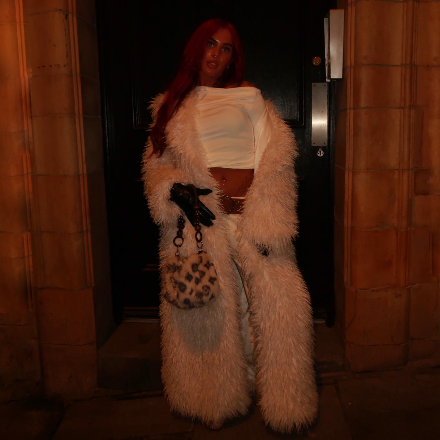 Shaggy cream faux fur coat